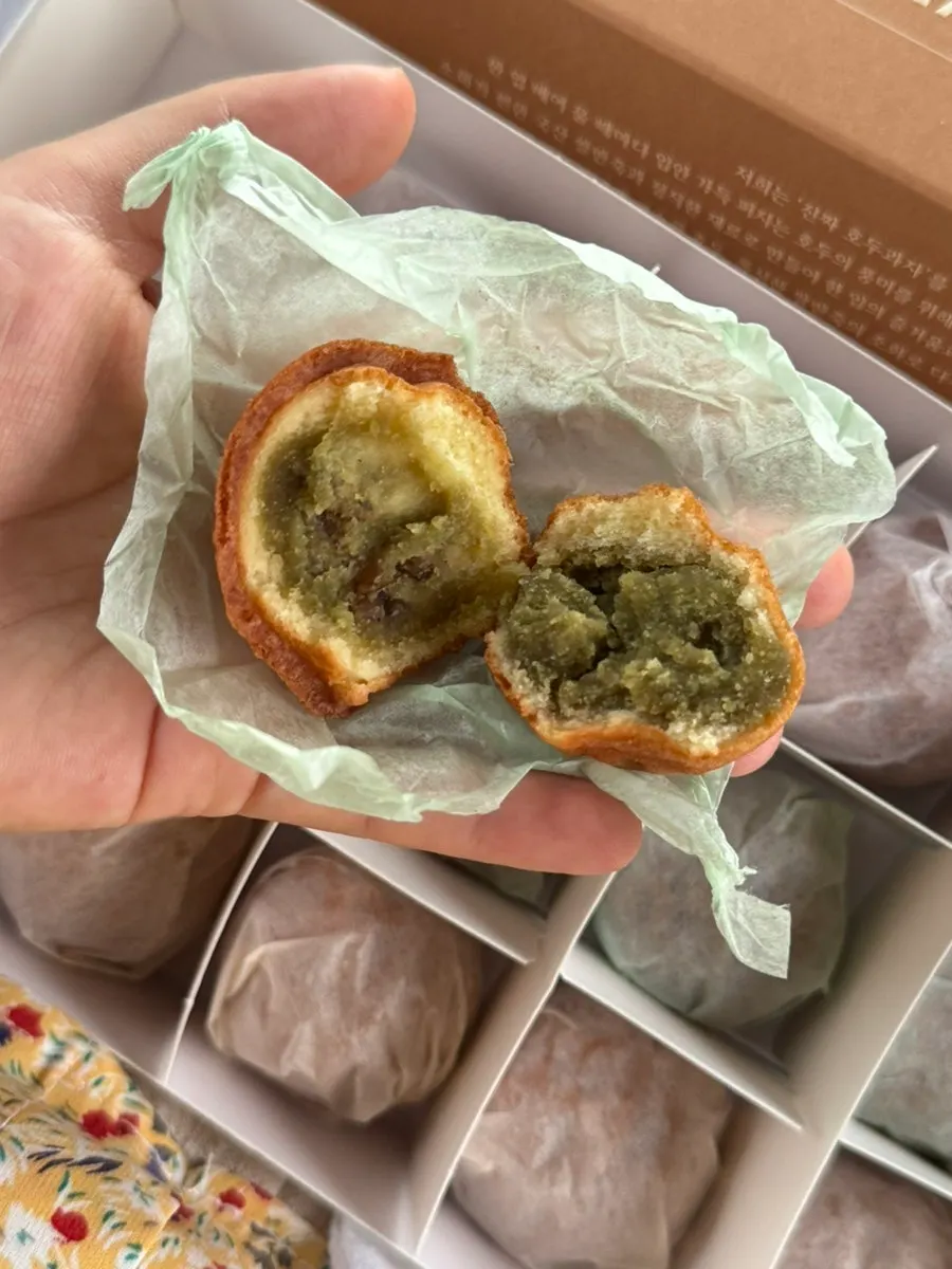 Cross-section showing matcha cream and a whole walnut