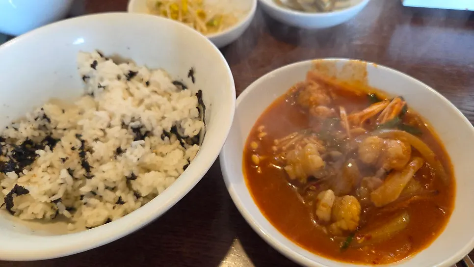Inside the hot pot, packed with tripe and vegetables