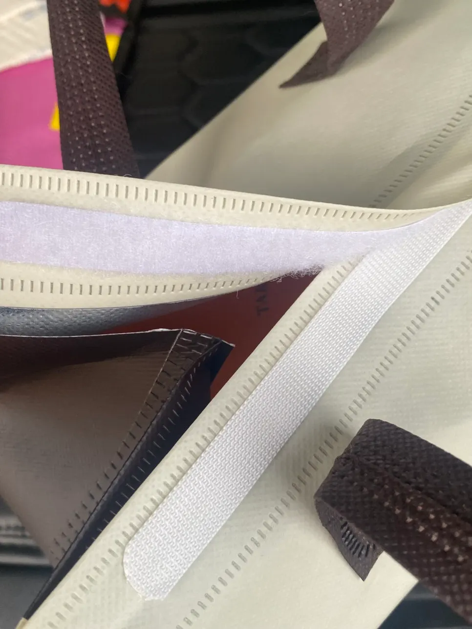 Cooler bag with torn velcro