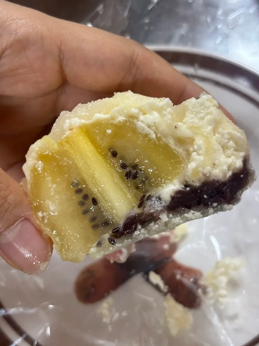 Cross-section of fruit mochi cut in half