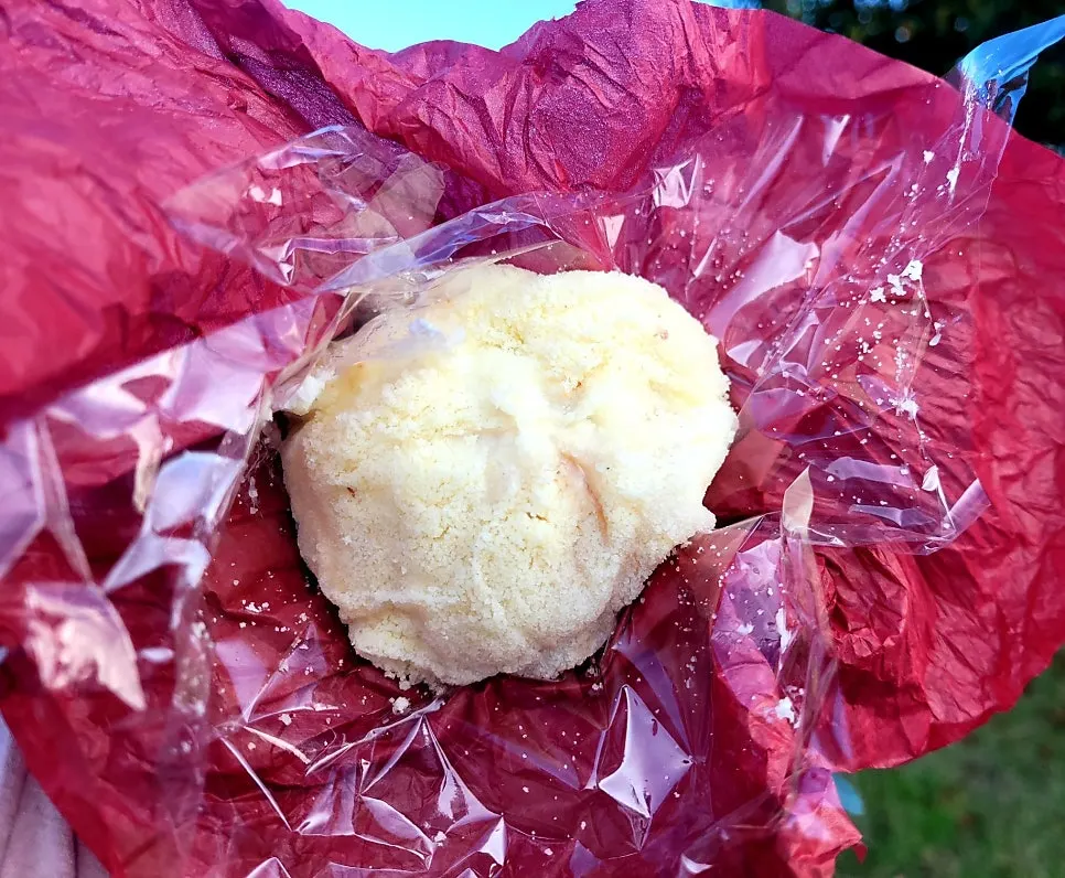 Peach mochi with wrapping unfolded