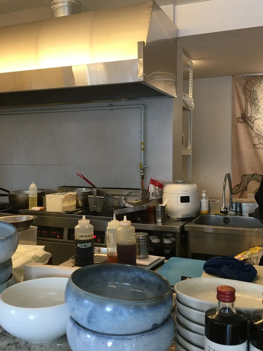 View of Goyu's open kitchen from the counter seats