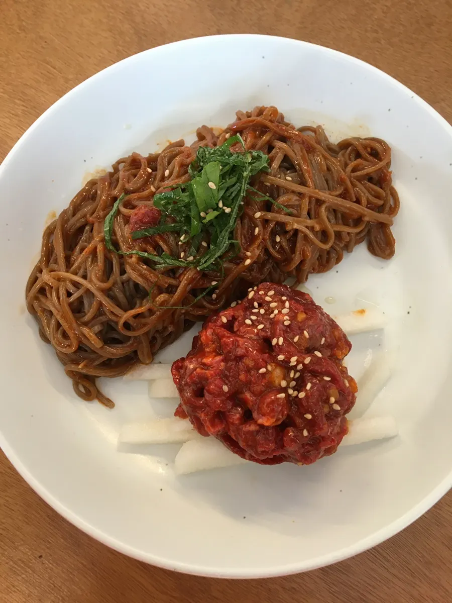 A bowl of Goyu's hanwoo yukhoe bibim buckwheat noodles