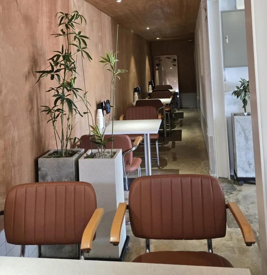 Two-seat tables arranged with atmosphere at Midam Kitchen