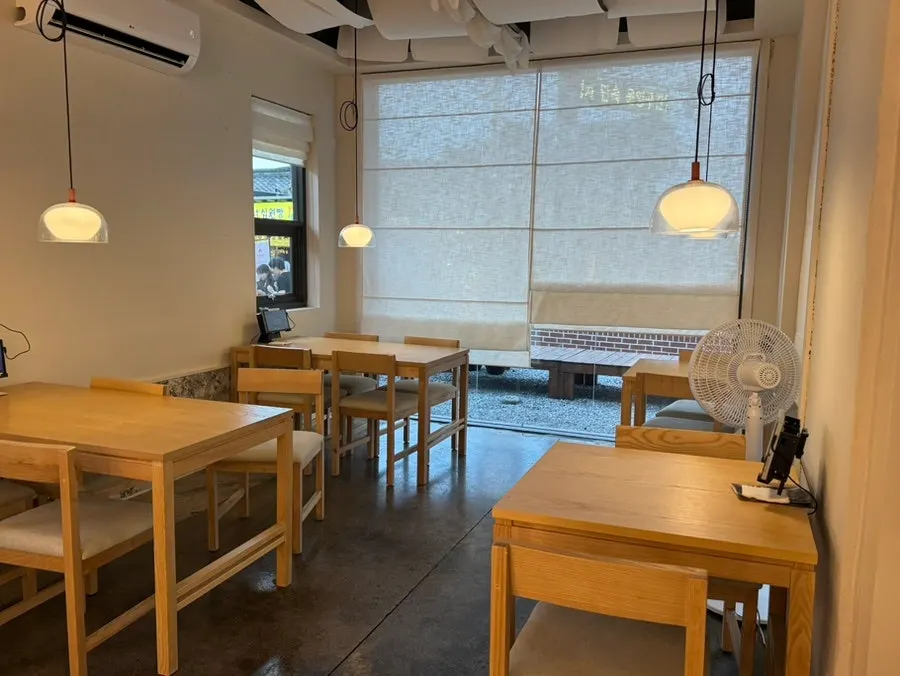 Courtyard view at Goyu with a wooden bench