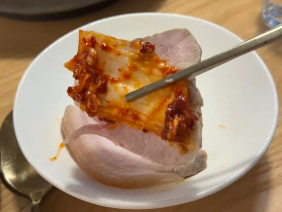 Thinly sliced cold pork with kale ssambap spread