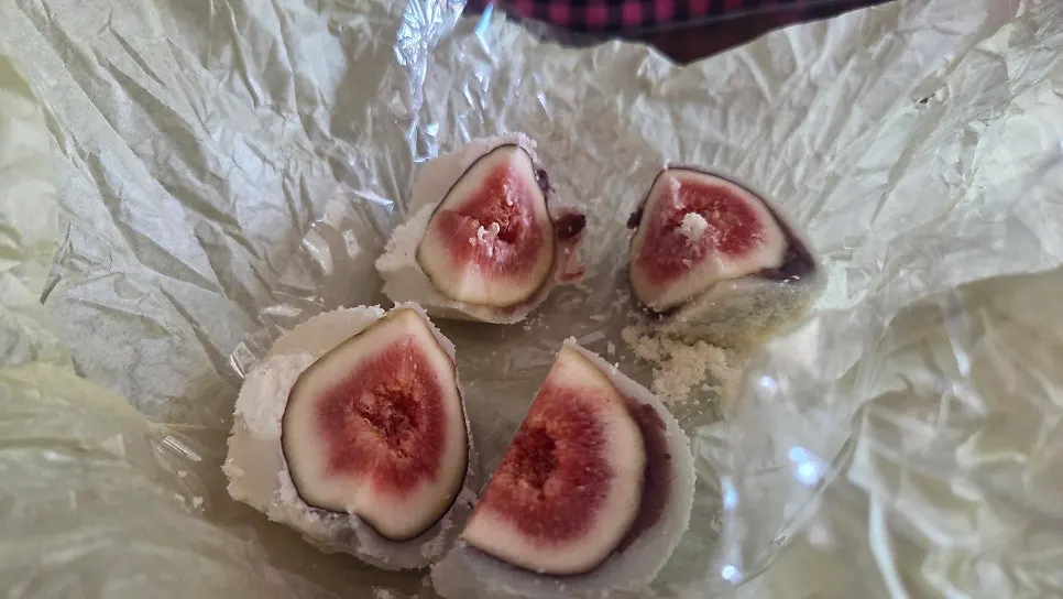 Fig mochi cut in half showing the filling