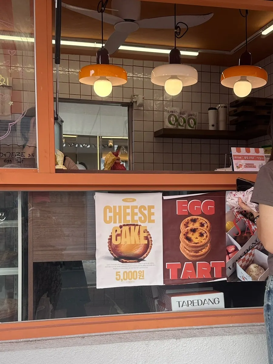 Tareudang's fruit mochi display case and menu board