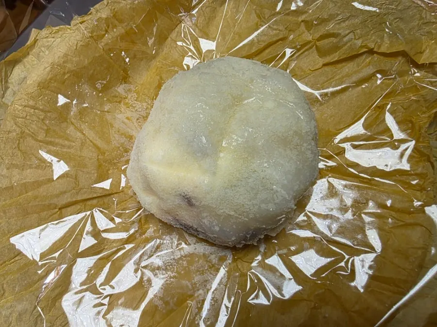Gold kiwi giant fruit mochi in yellow wrapping