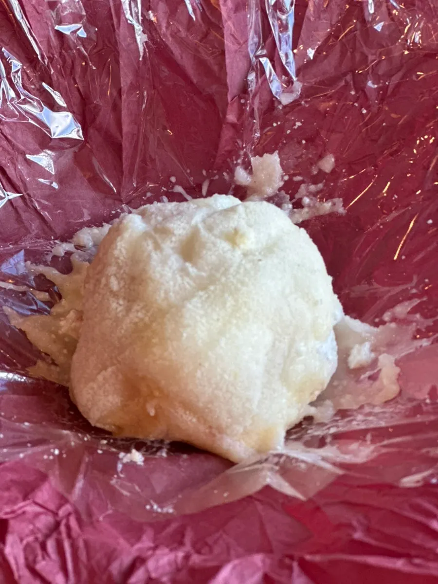 Inside of the fruit mochi with a whole peach
