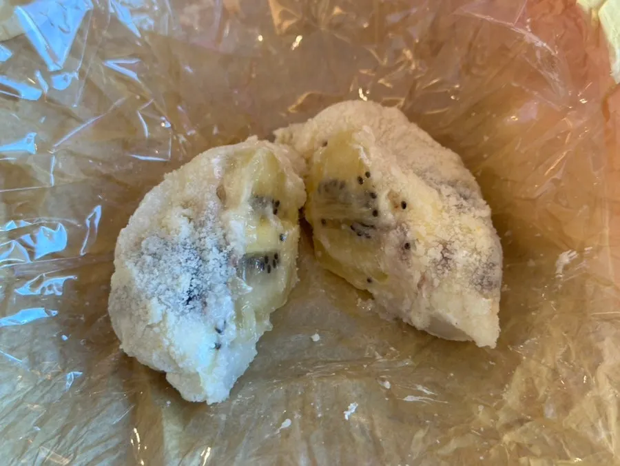 Cross-section of the gold kiwi mochi with red bean inside