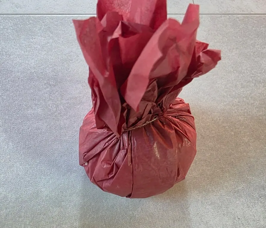 Peach fruit mochi in red wrapping