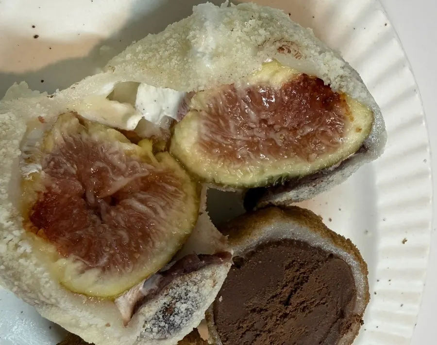 Cross-section of fig yogurt mochi with a whole fig inside