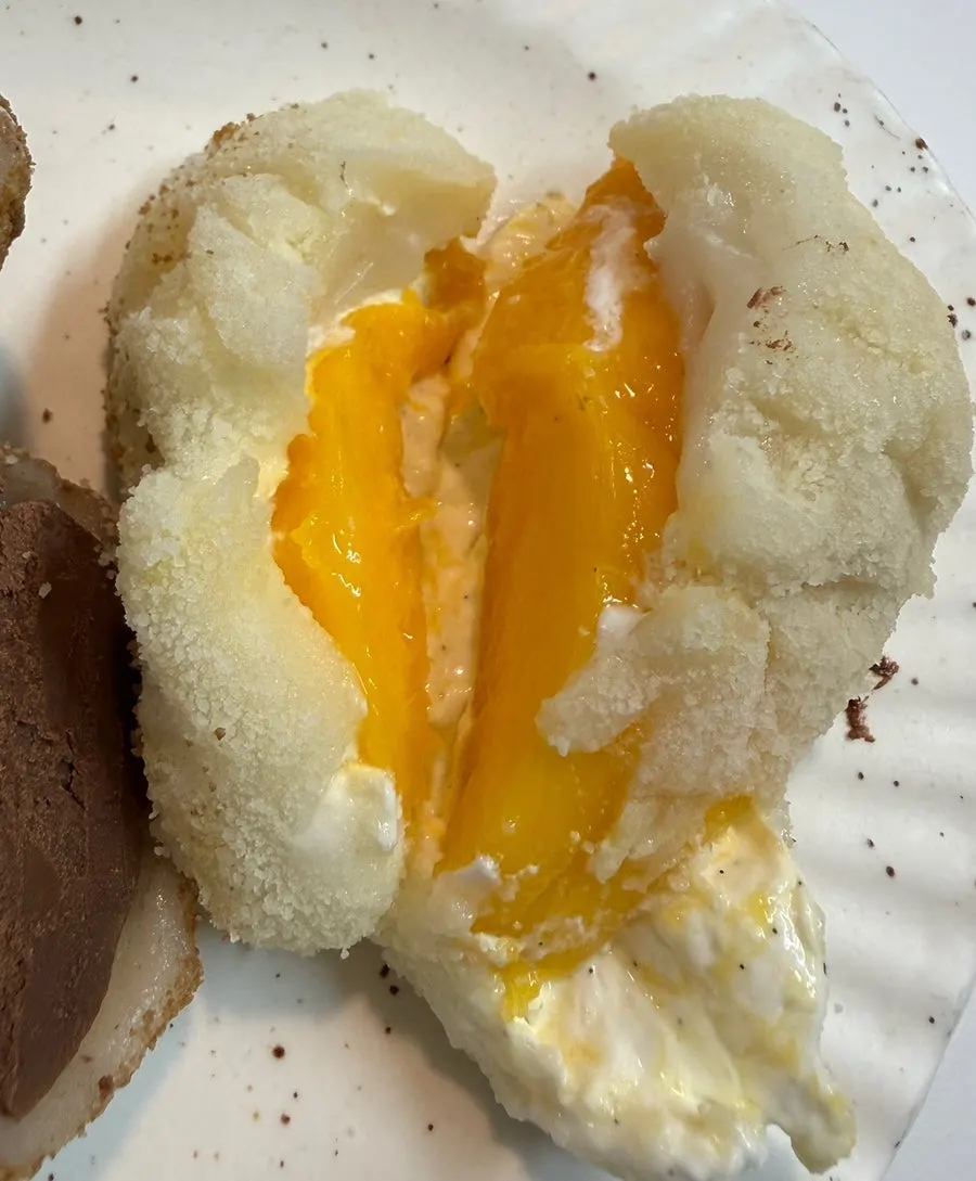 Mango yogurt mochi with a big chunk of fresh mango inside