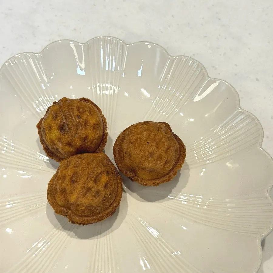 Close-up of a single Buja Hodu walnut pastry