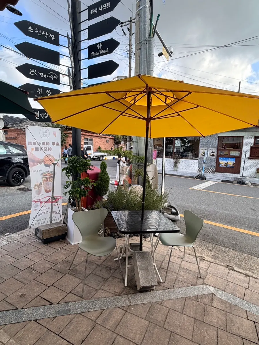 Coffee and walnut pastries on an outdoor table