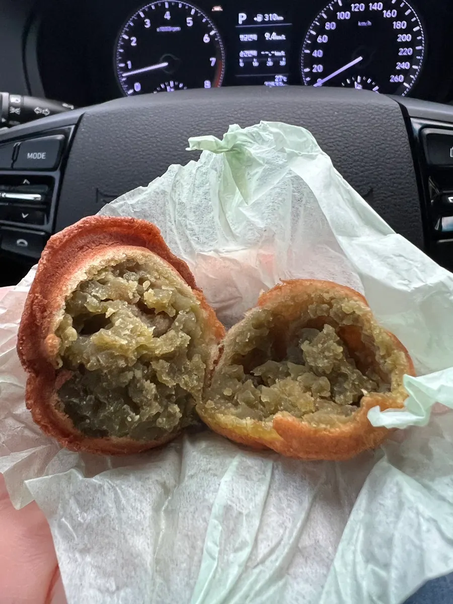 Eating Buja Hodu walnut pastries in the car