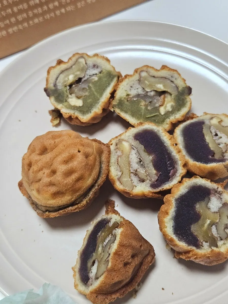 Cross-section of a walnut pastry showing a large walnut piece