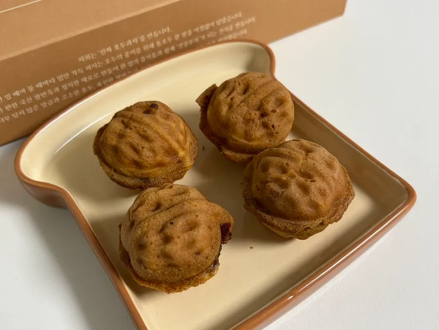 Individually wrapped walnut pastries color-coded by flavor