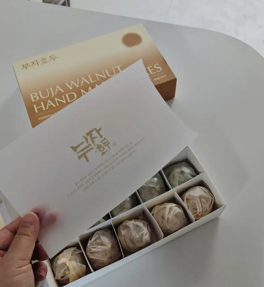 Walnut pastries neatly arranged inside the box