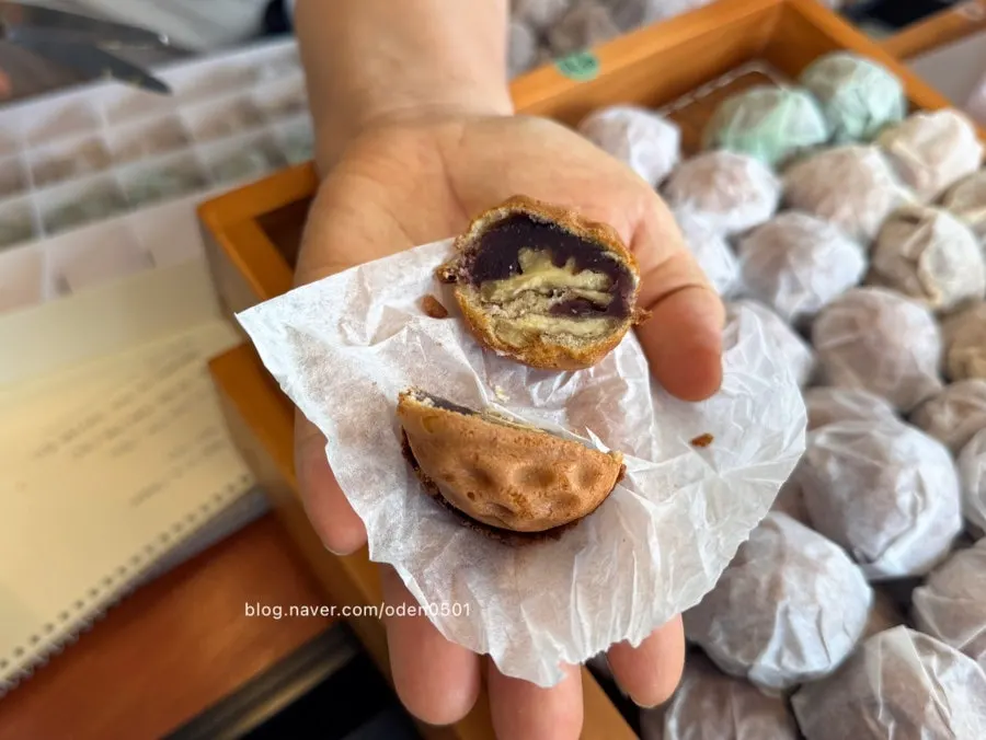 Cross-section of a Buja Hodu walnut pastry cut in half