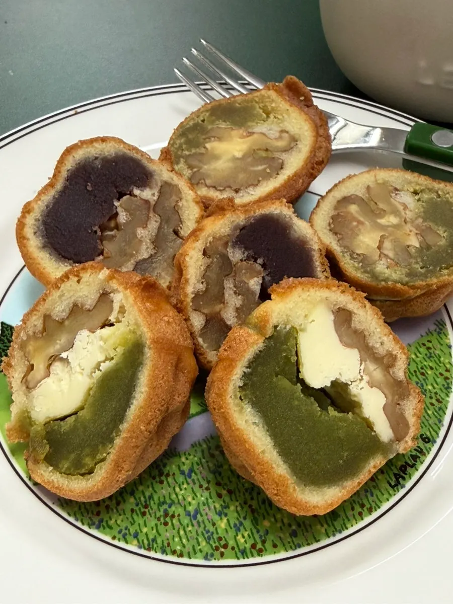 Plate of three walnut pastry flavors cut in half