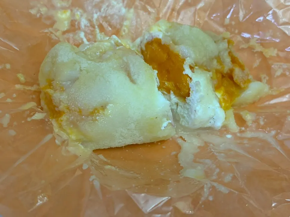 Close-up of the peach flesh inside the mochi