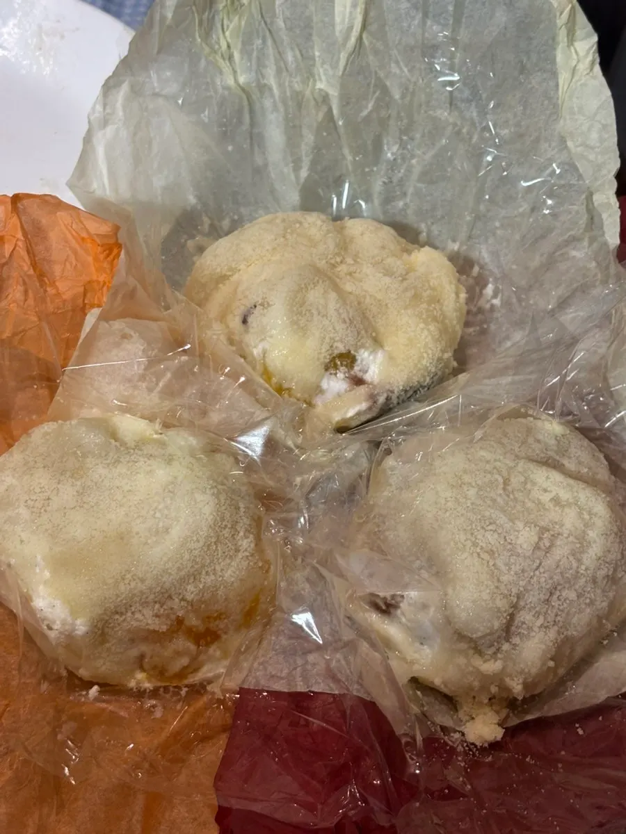 Tareudang fruit mochi size compared next to a hand