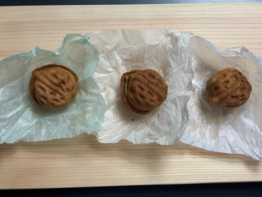 Walnut pastries arranged neatly on a plate