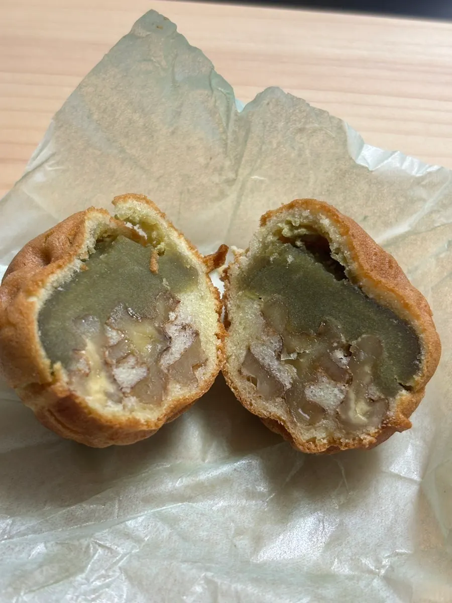 Cross-section of matcha walnut pastry