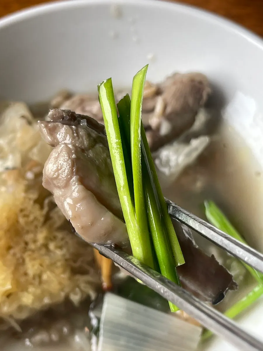 Tender chicken wrapped with chives