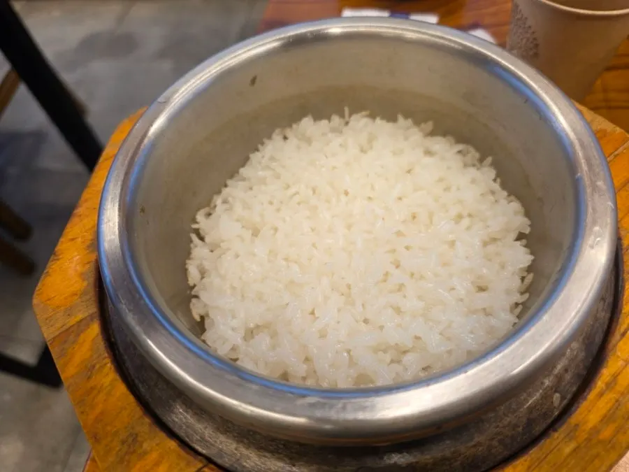 True abalone pot rice completely covered with abalone
