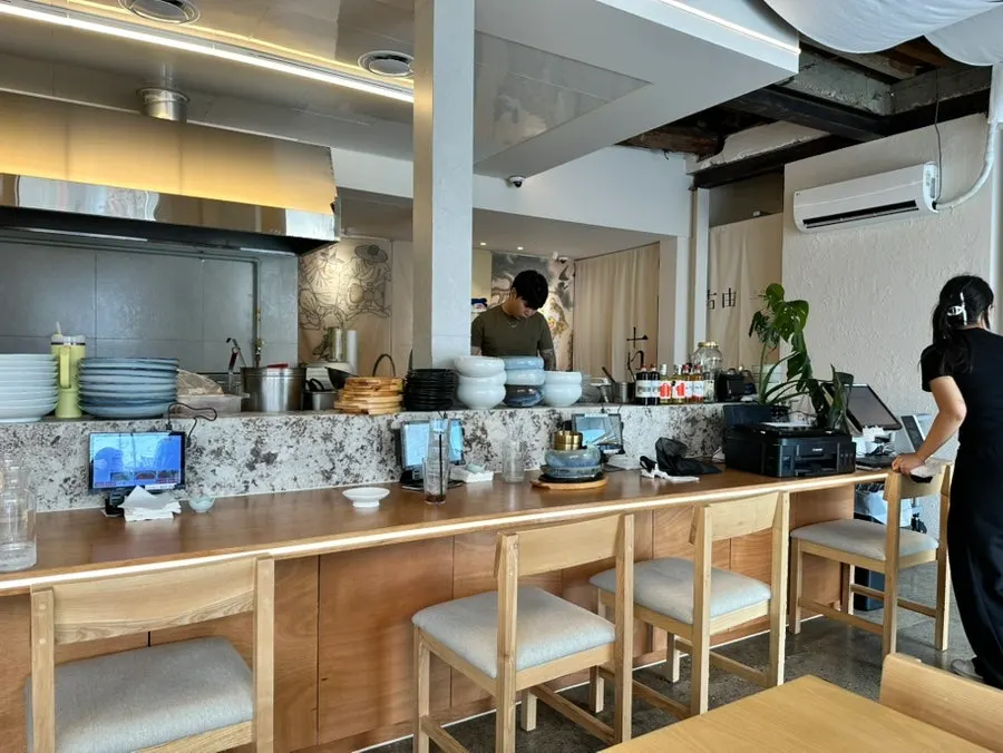 Goyu’s open-kitchen bar seating