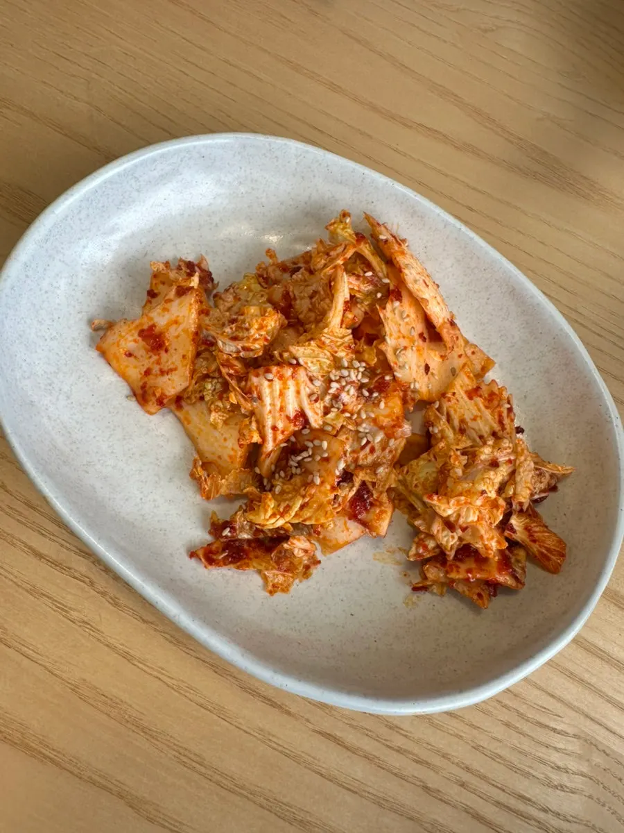 Banchan served after ordering at Goyu