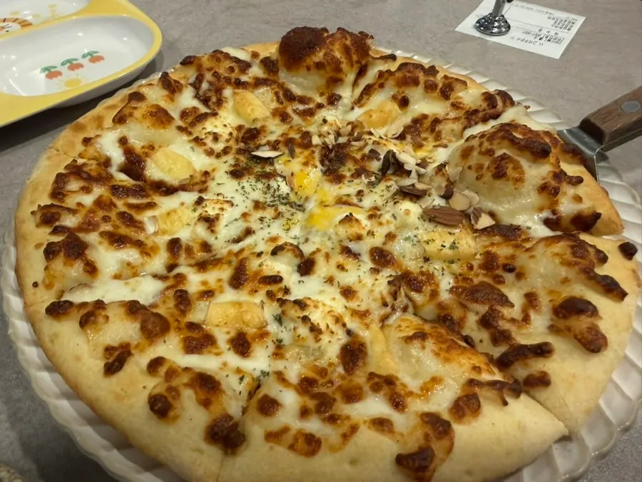 Quattro cheese pizza generously topped with cheese