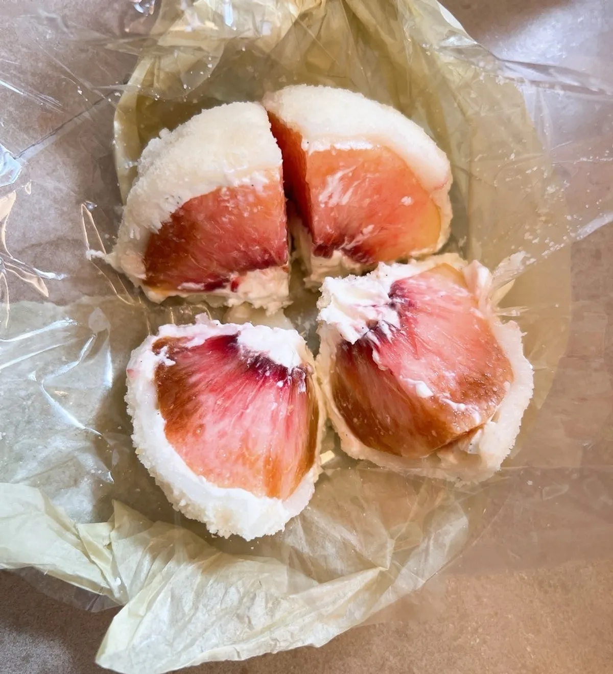 Peach yogurt mochi with a whole peach inside