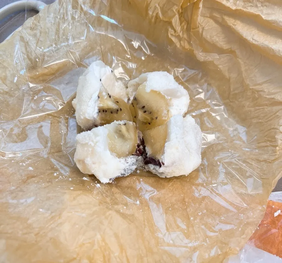 Golden kiwi mochi filled with red bean