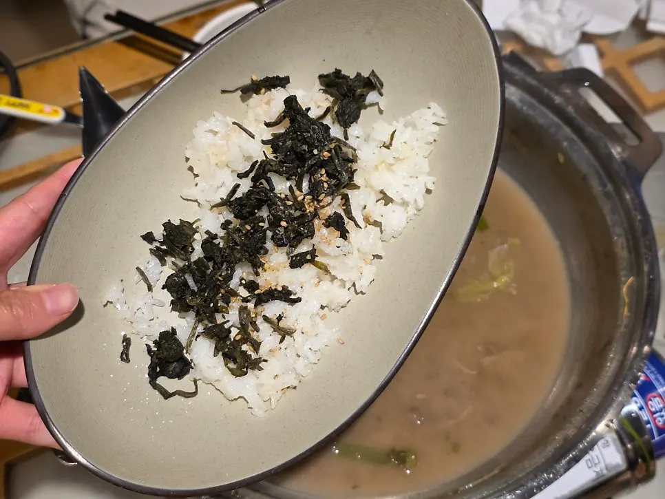 Kalguksu noodles boiled in the hot pot broth