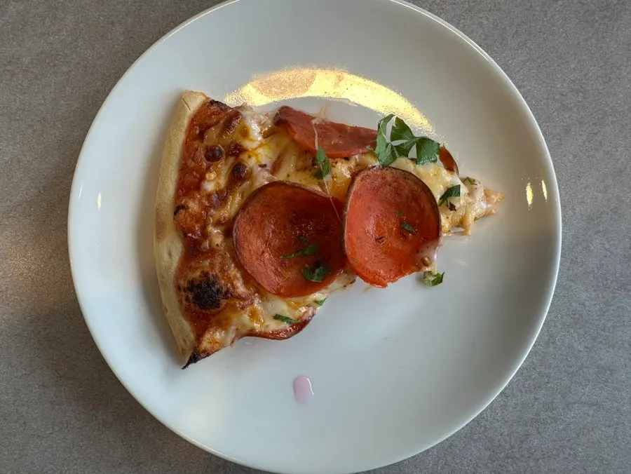 Pepperoni pizza topped with cheese