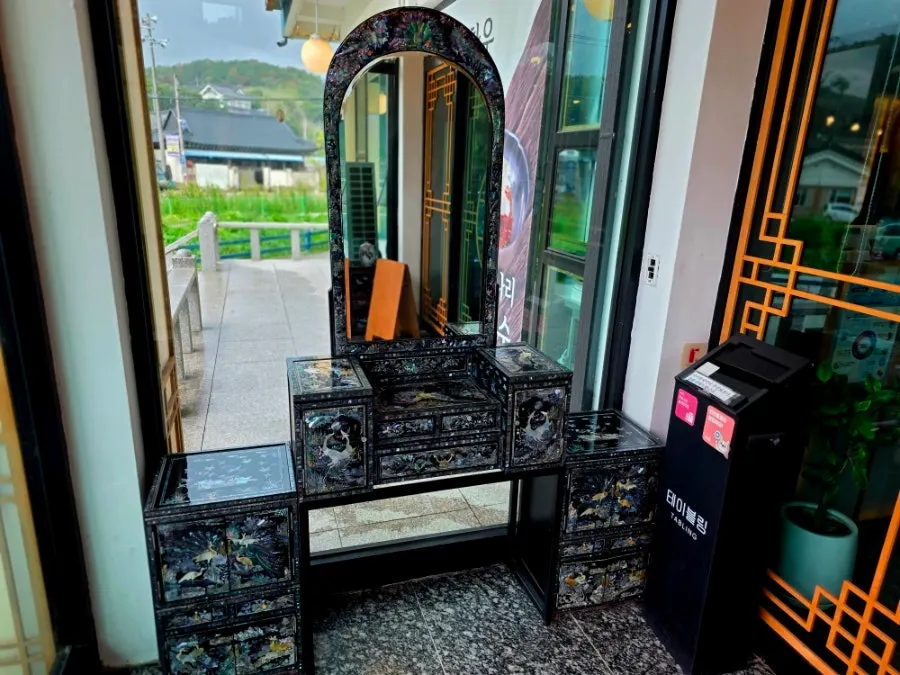 Nostalgic mother-of-pearl vanity displayed inside the restaurant