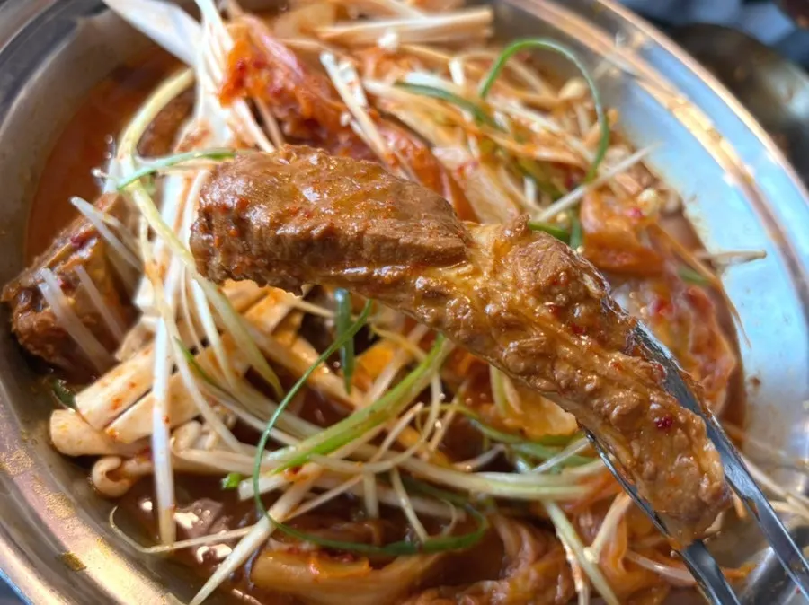 Aged kimchi pork back-rib stew bubbling away