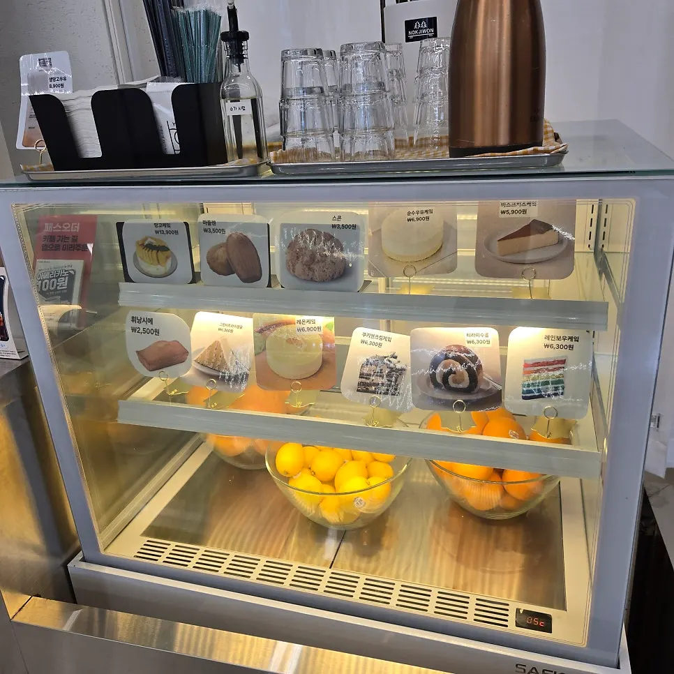 Display area prepared with fruit and desserts