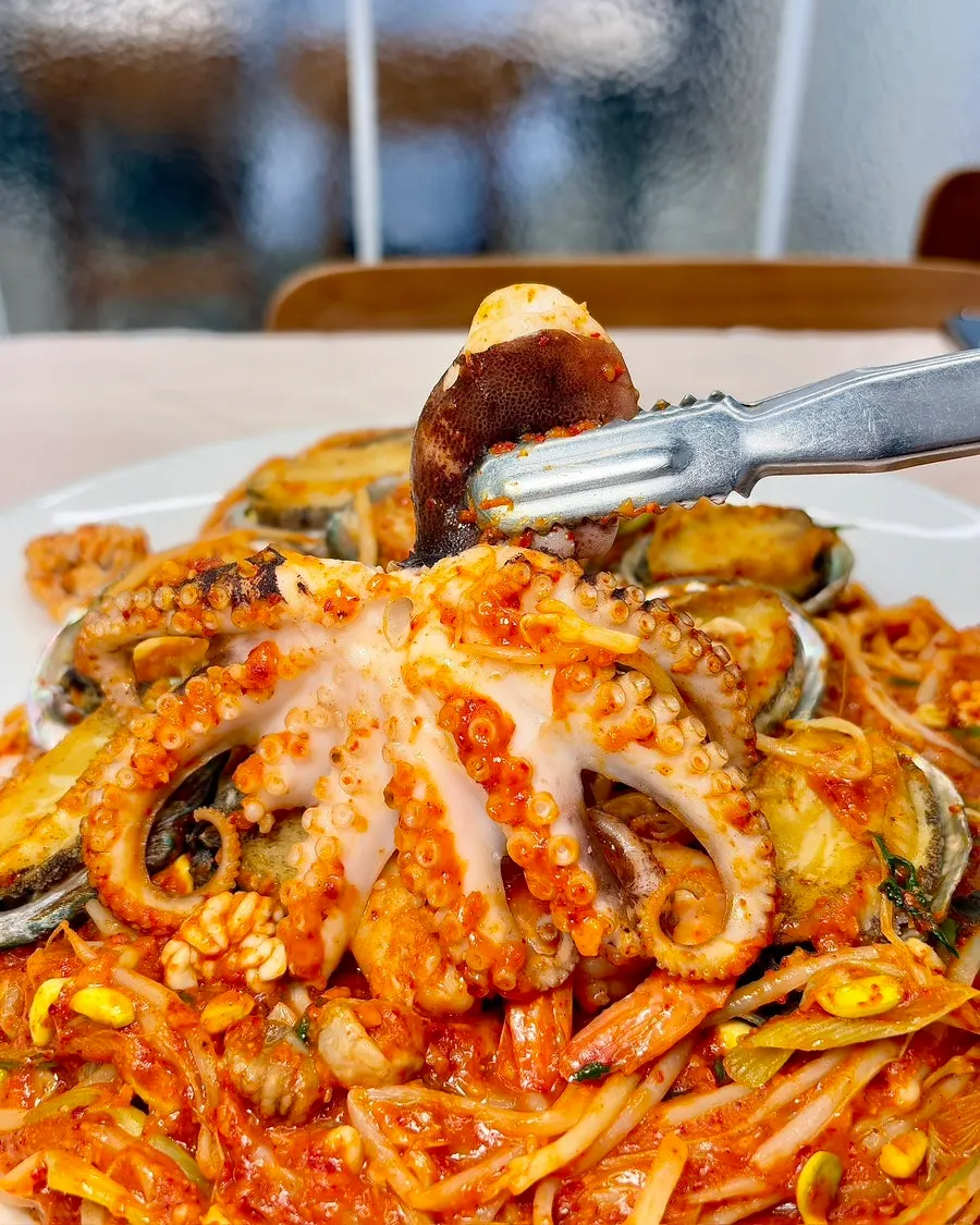Close-up of the seafood piled high in the stew