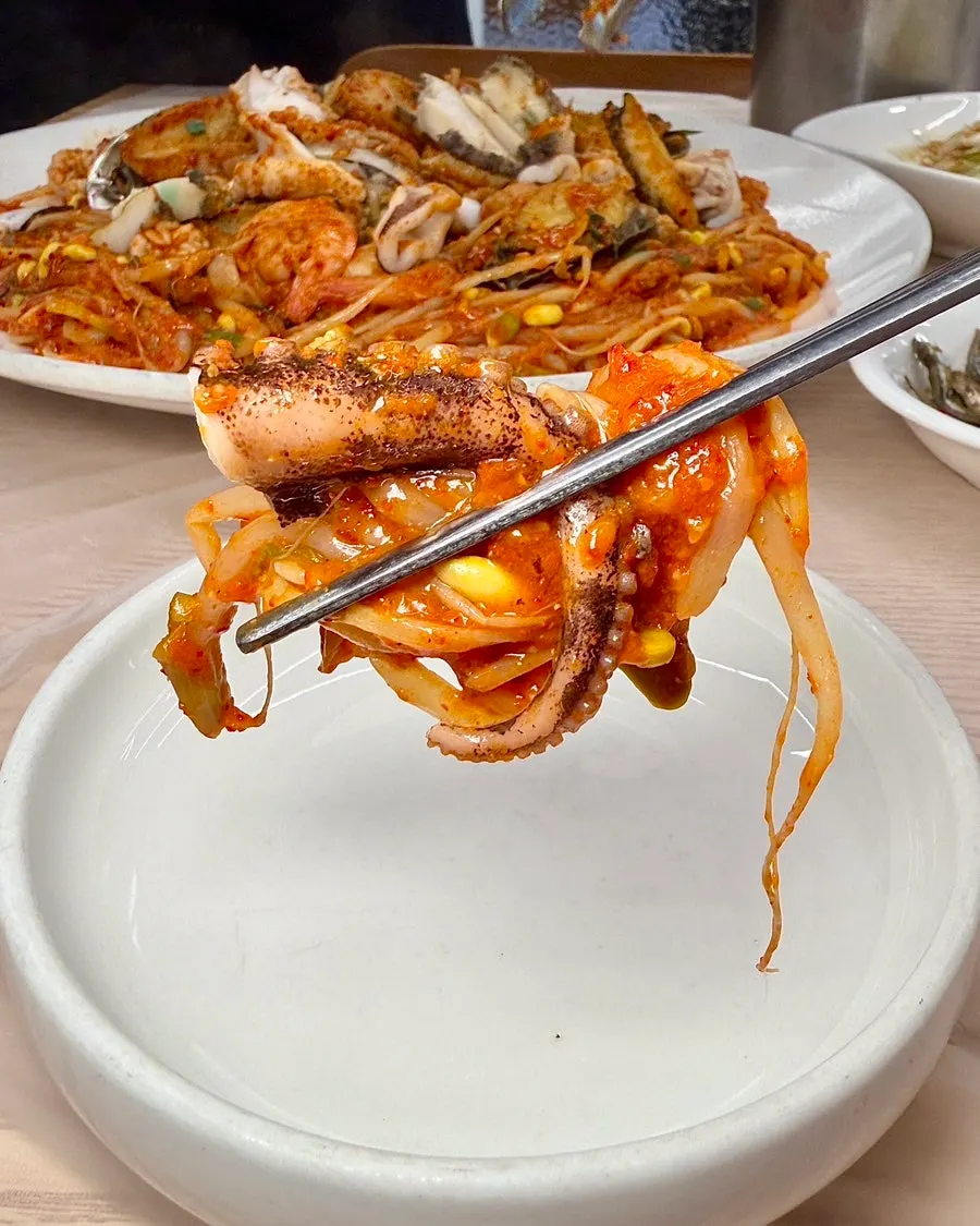 Seafood in the stew coated in spicy sauce