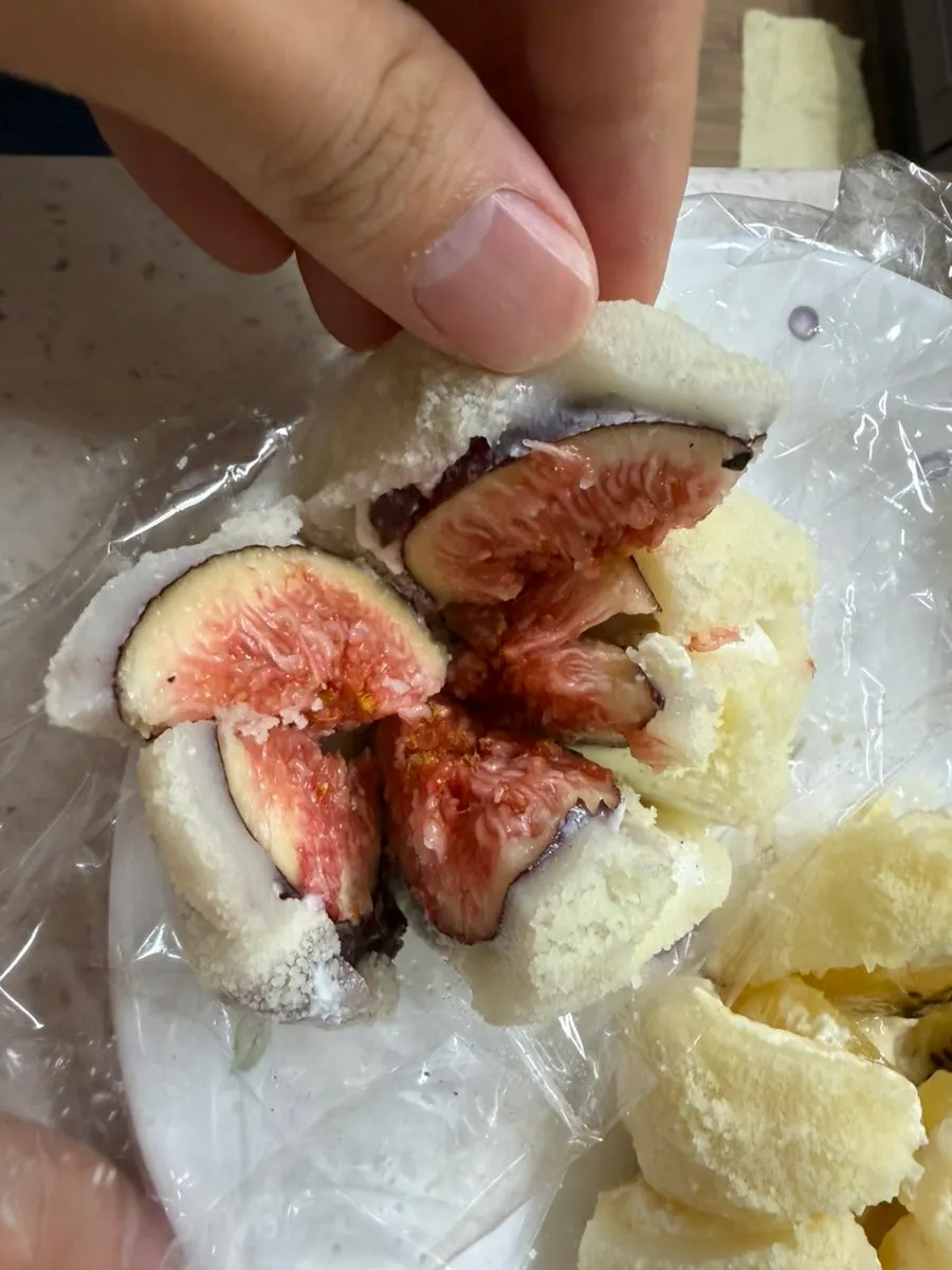 Cross-section of Tareudang's mango mochi showing fruit and cream