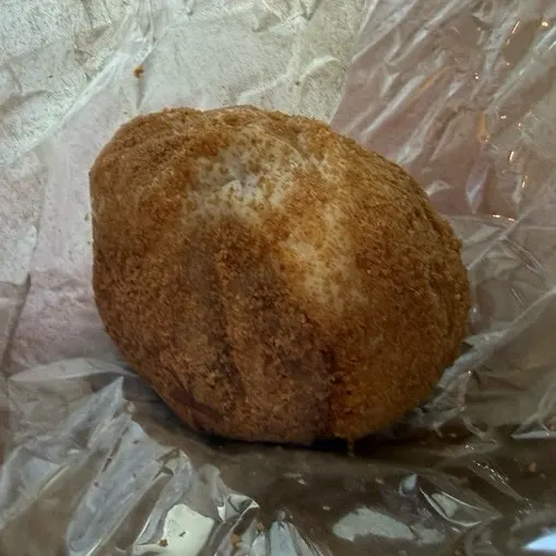 Cross-section of the kiwi mochi cut open at the hotel