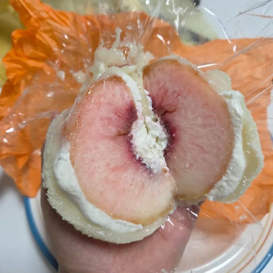 Cross-section of mochi filled with whole fruit