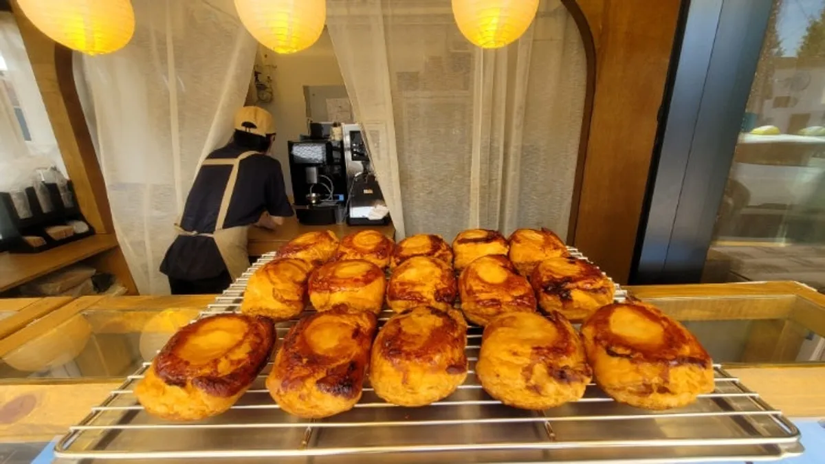 Close-up of freshly baked golden pies