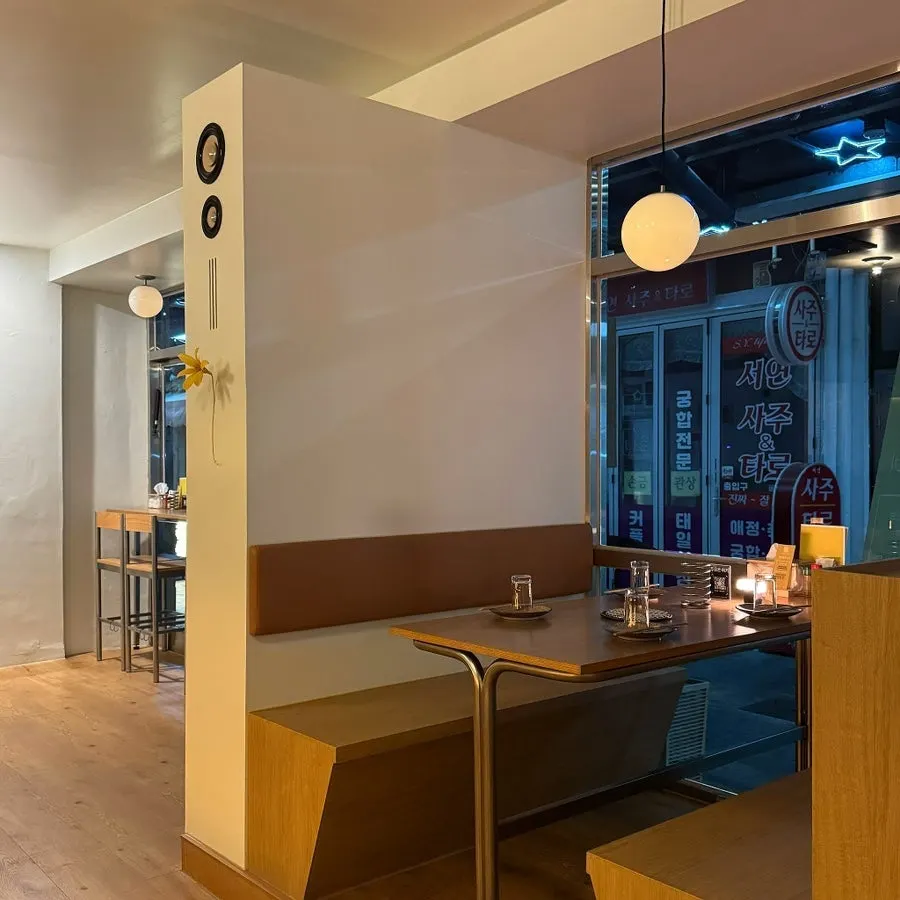 View of the counter seating and cooking station at Yakitori Sogi