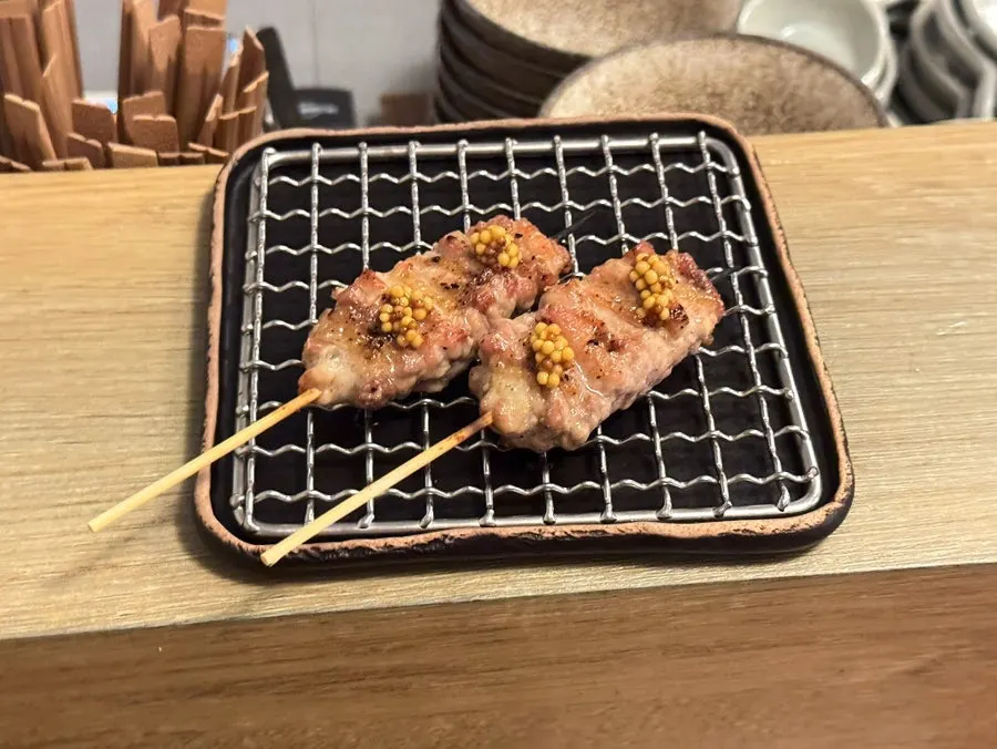 Plump grilled chicken heart skewer